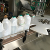 KIS-1800转盘式牛奶瓶铝箔膜封口机